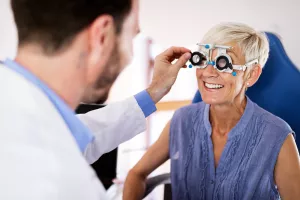 Doctor examining a patient's eyes during an Ophthalmology appointment.